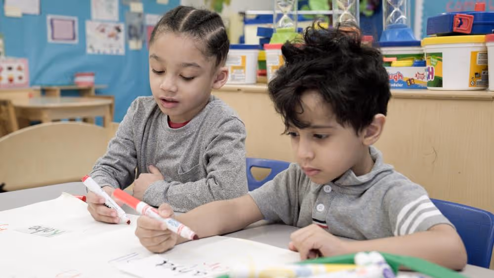 Kids coloring together