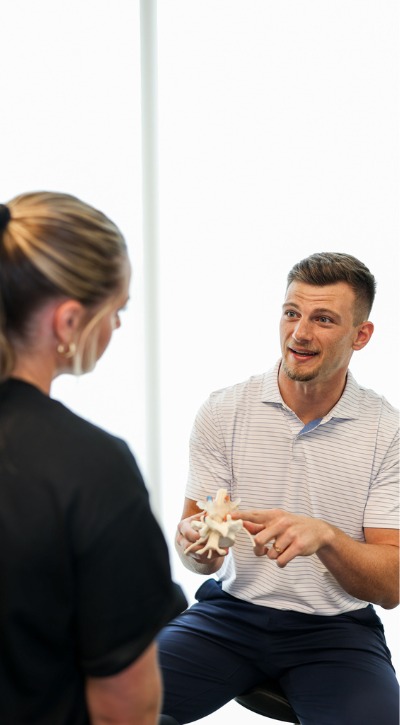 Chiropractor doing an adjustment on a patient's foot