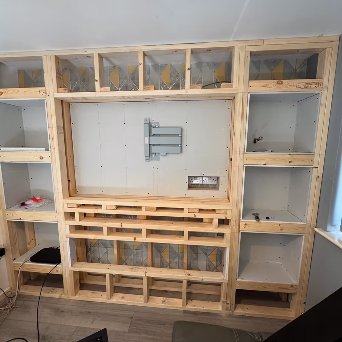 White media wall during installation