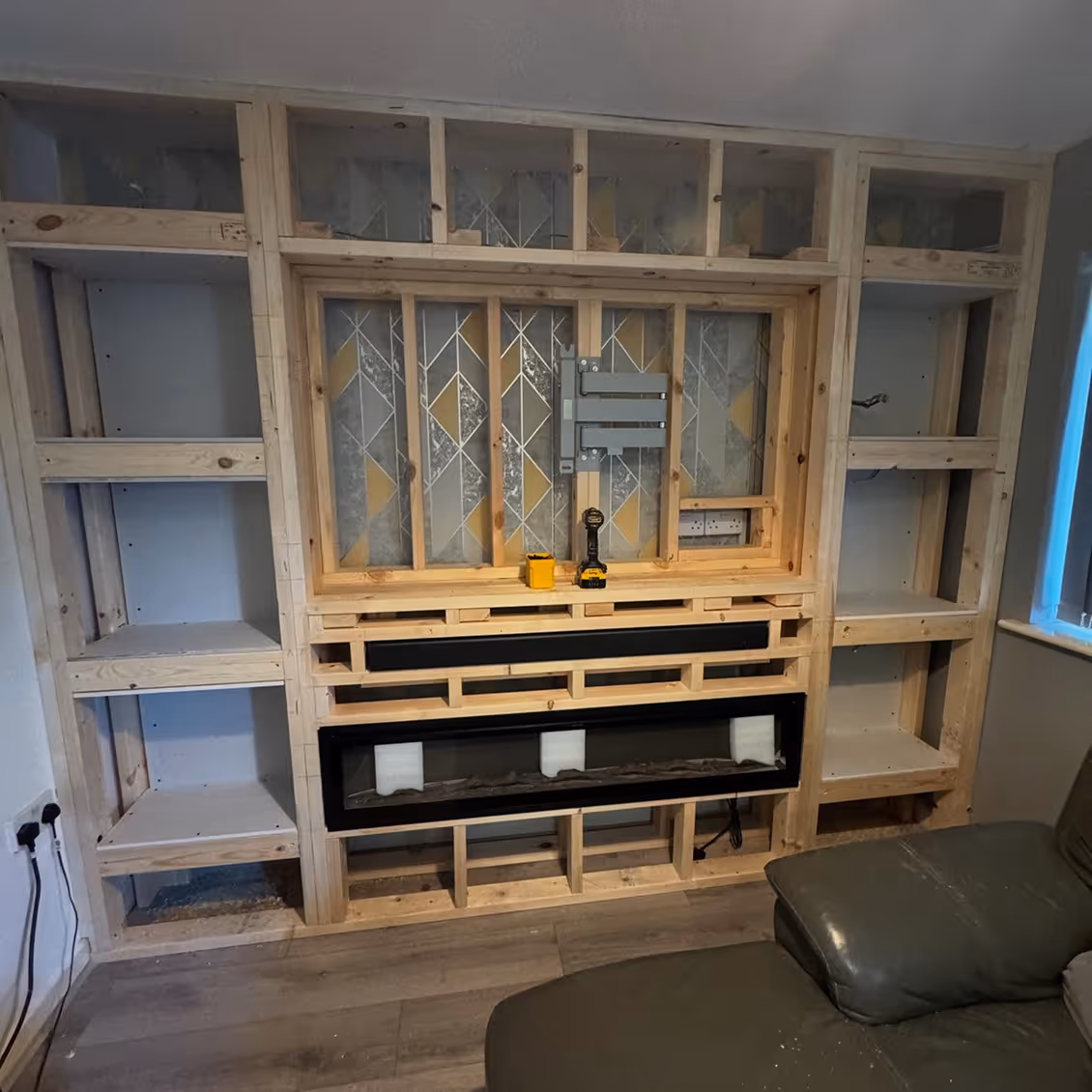 Wooden installation of media wall