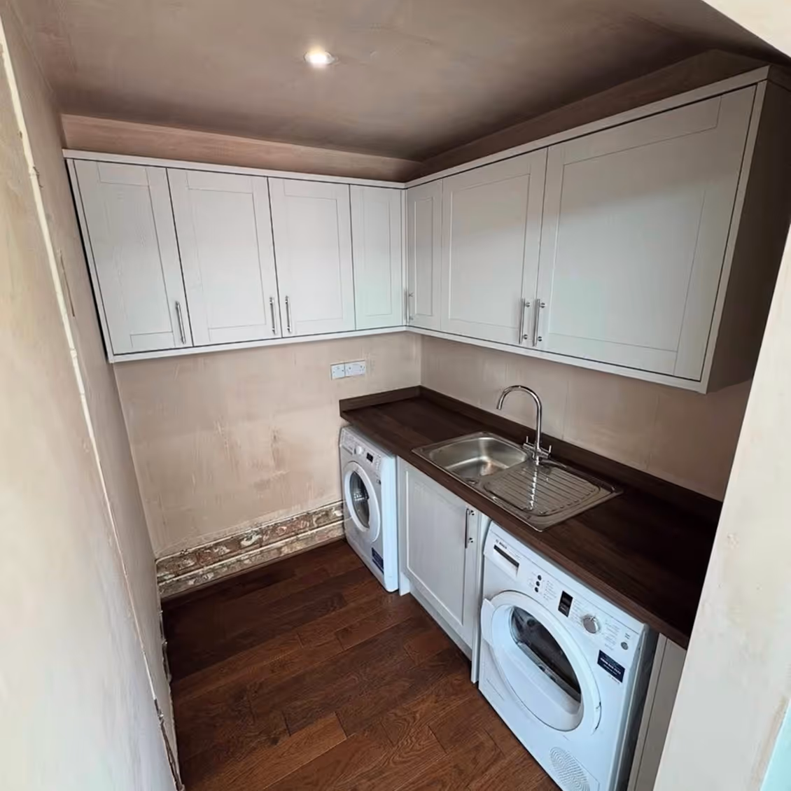 Updated utility room with new cabinets