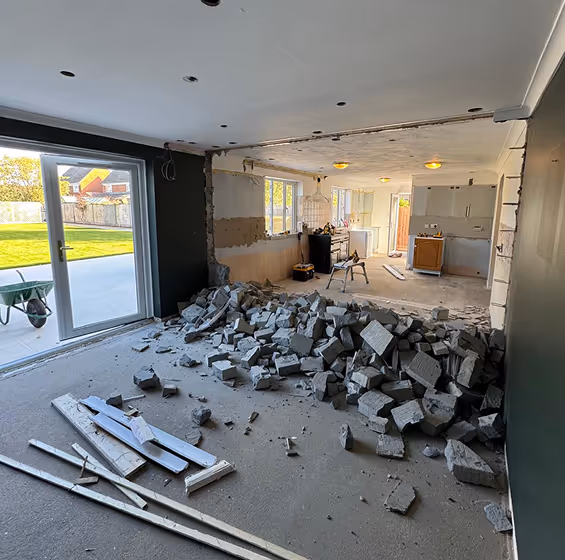 Wall being knocked down