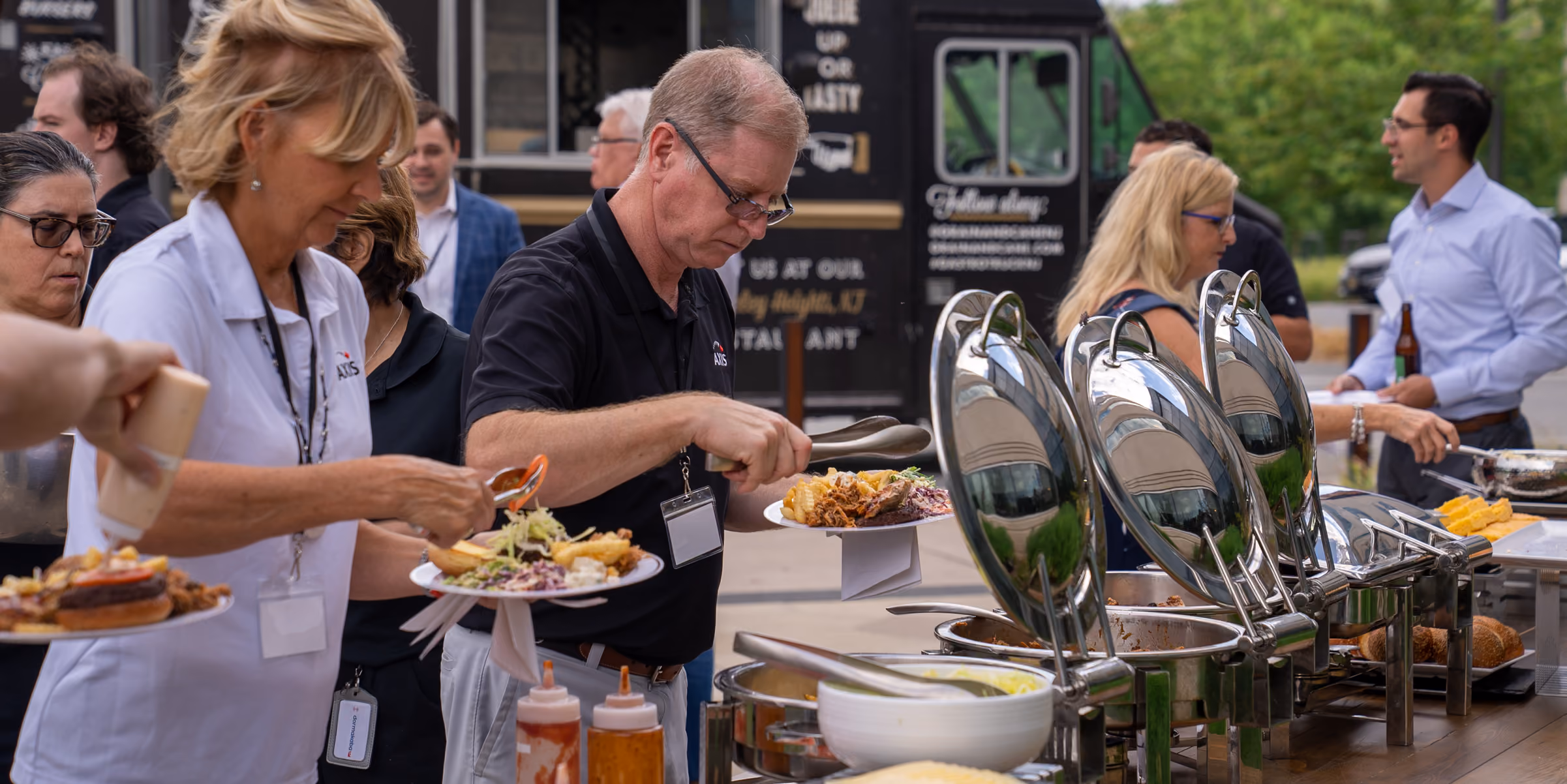 Guests serving themselves at a caterered event