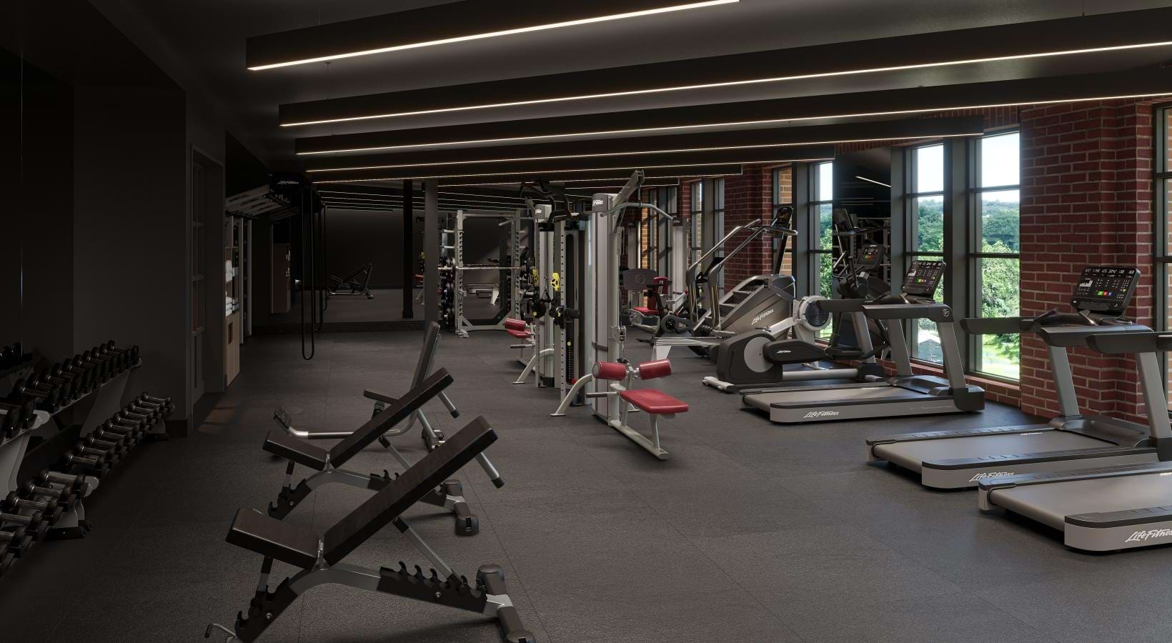 Residents exercising in the gym at RT Residences inspired by Fieldhouse gym