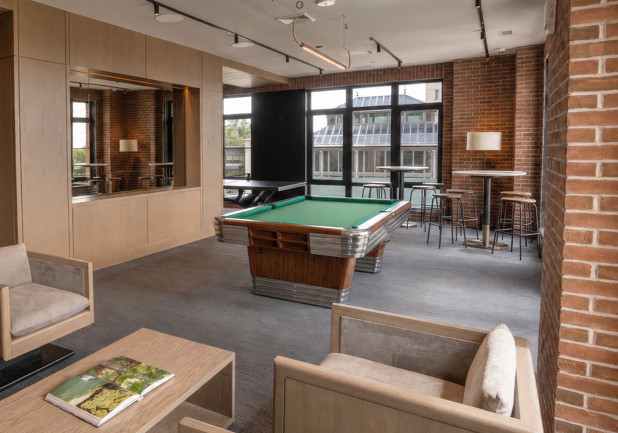 residents playing in the game room in the RT Residences