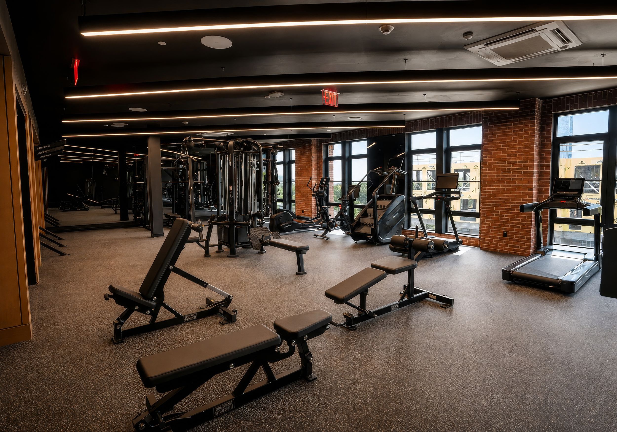 Residents exercising in the gym at RT Residences inspired by Fieldhouse gym