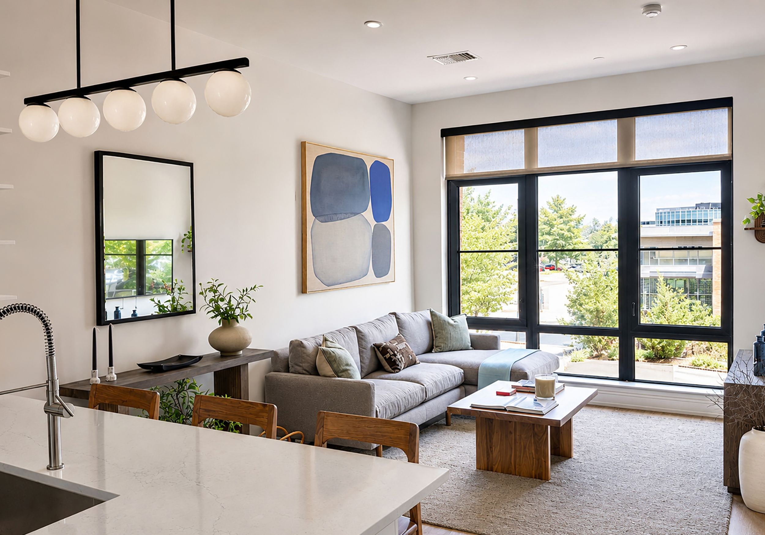 the living room of a model apartment at RT Residences