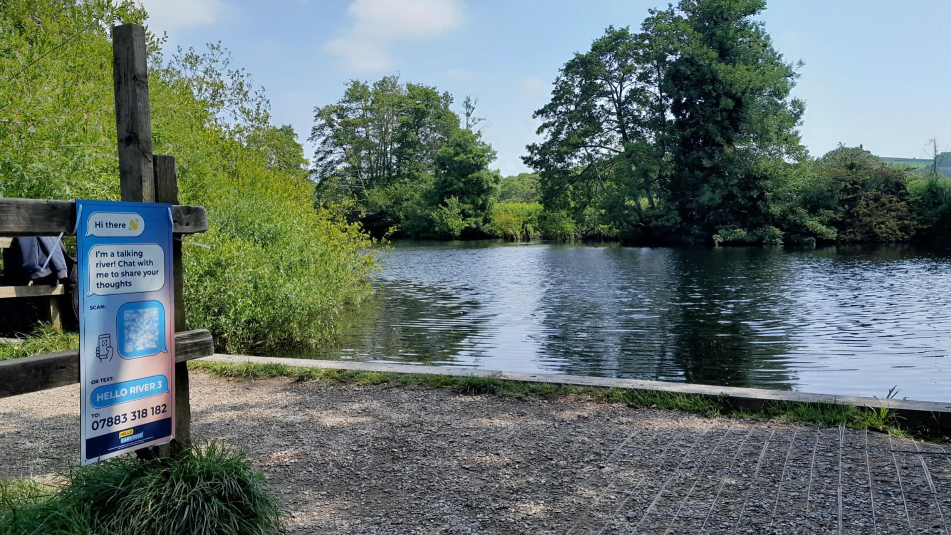 Interactive signage with South West Water next to river in South West of England, for visitors to share their feedback on water safety and quality