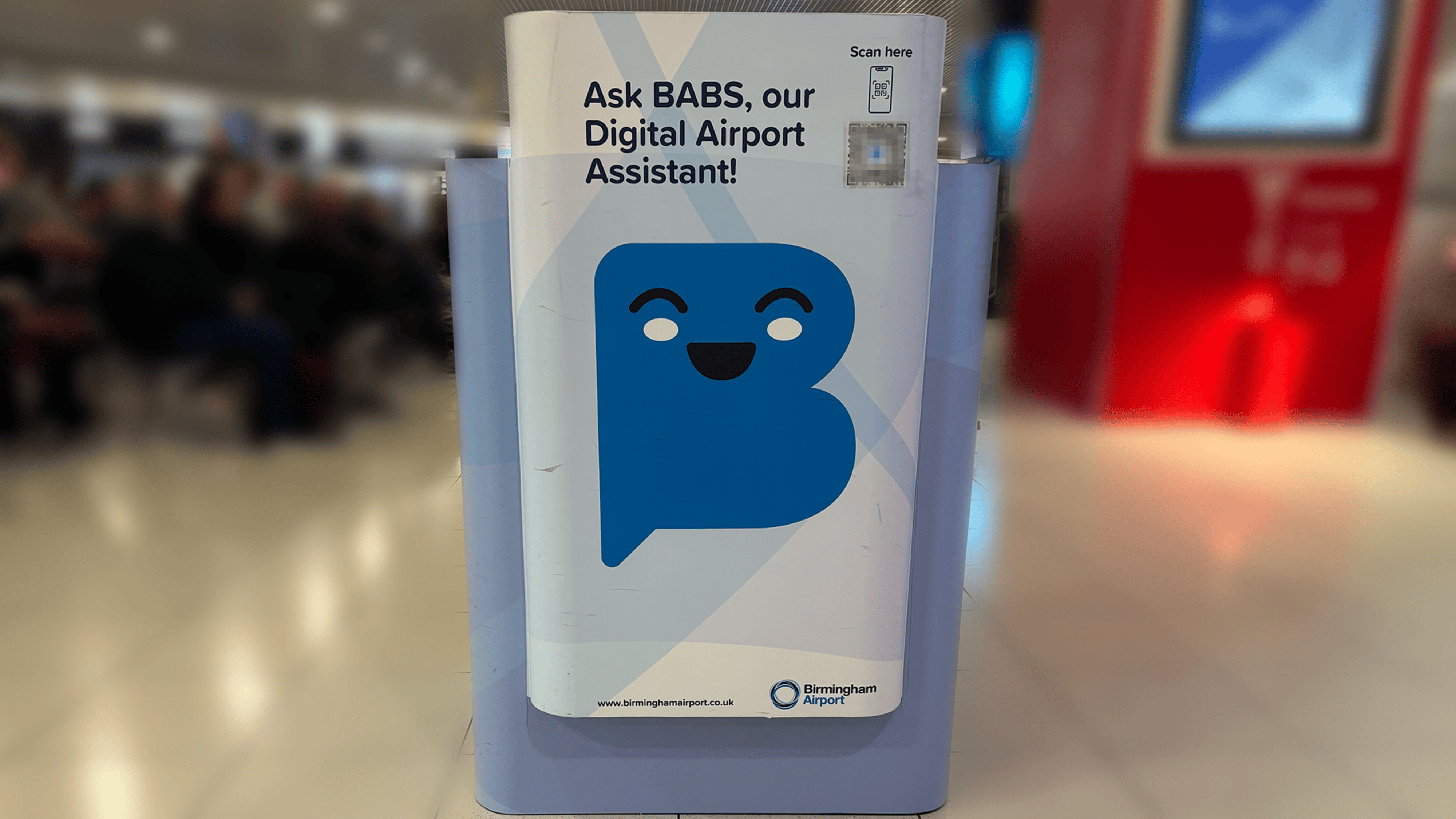The signage of BABS, the Digital Team Member supporting passengers at Birmingham Airport