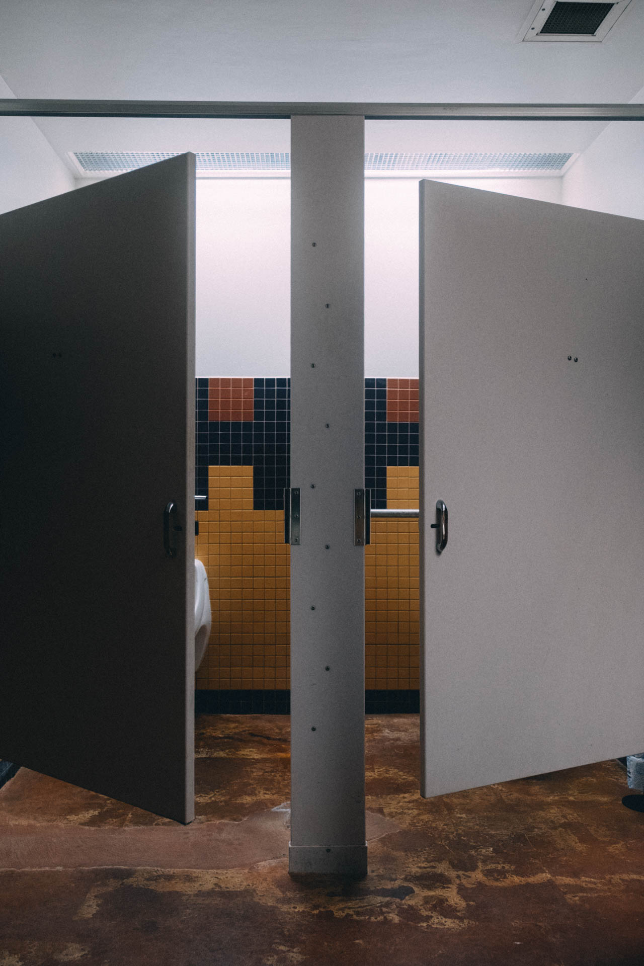 two stalls of a bathroom