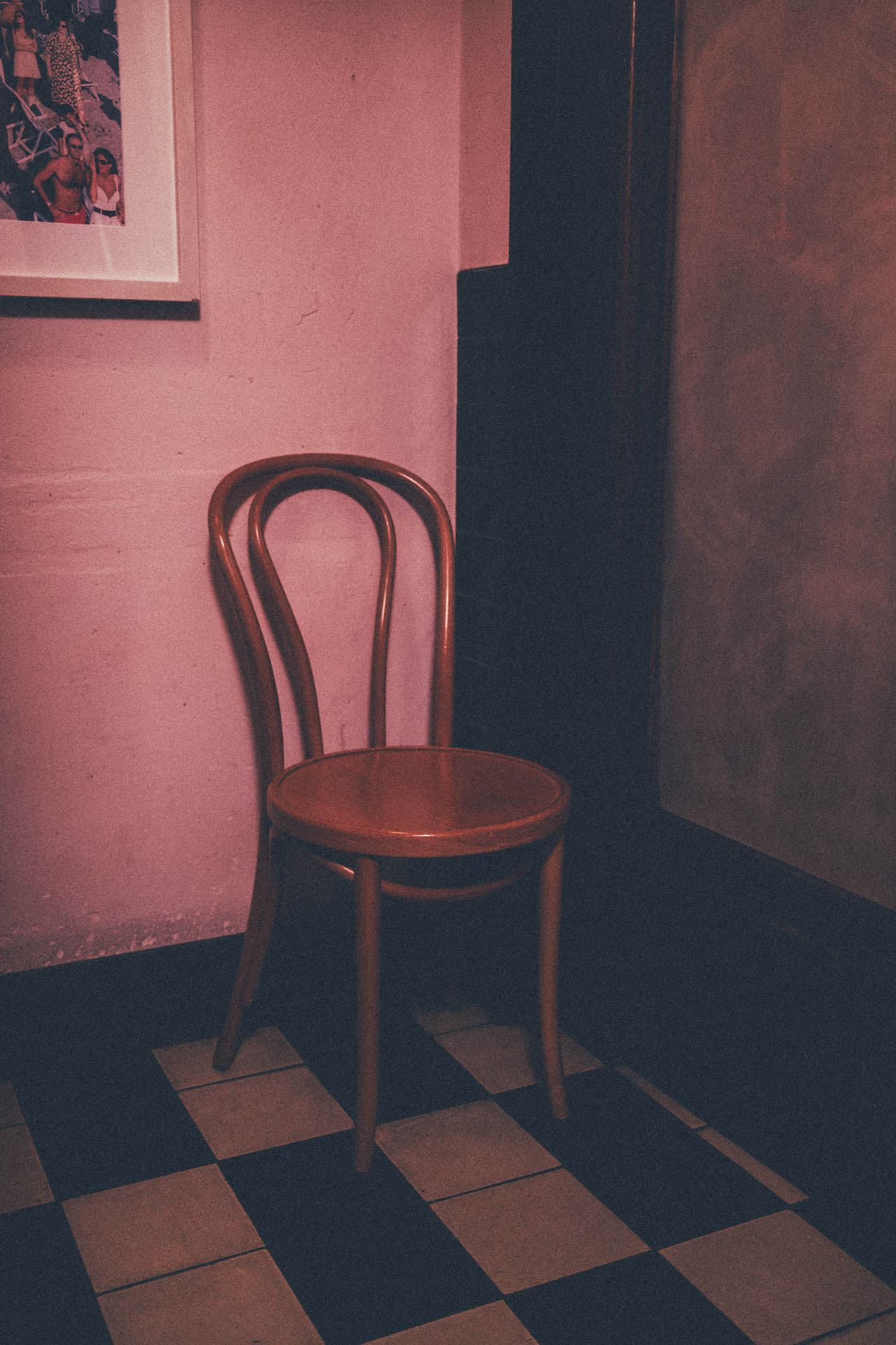 chair in a pink bathroom