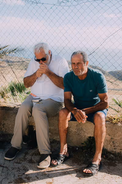 two men taking a break in Sicily thumbnail