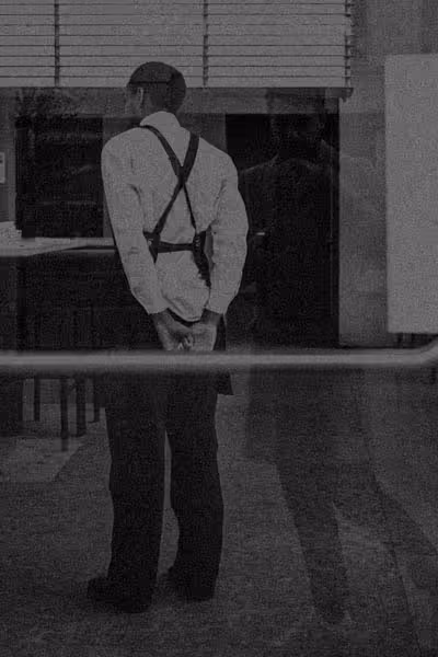 waiter standing away from the window thumbnail