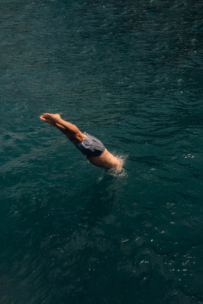 man diving into the ocean thumbnail