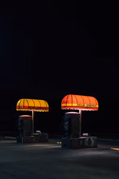 two vacuum stations at a retro car wash at night