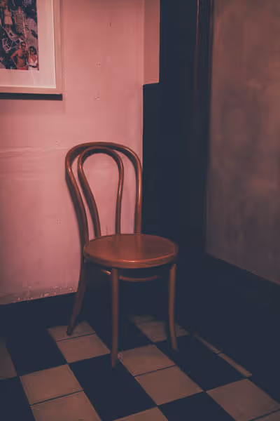 chair in a pink bathroom