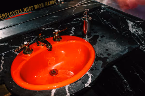 bright red sink in a bathroom