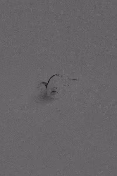 faceless woman coming out of grainy water