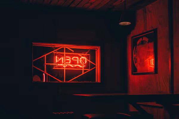 neon open sign backwards at Austin bar