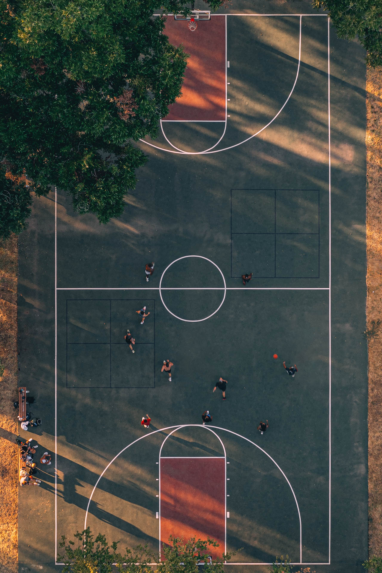 red and green basketball court as seen from above in Austin