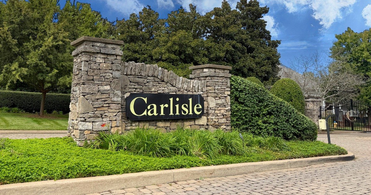 Carlisle stacked stone entrance sign and gated drive with landscaping, Franklin, Tennessee