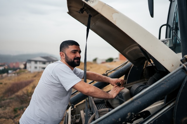 Man fixing a tractor
