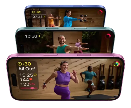 Three iPhones with Apple Fitness+ workout videos playing.