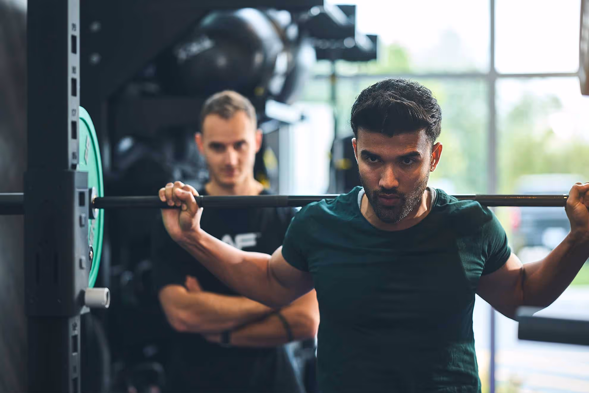 Man training with dumbells