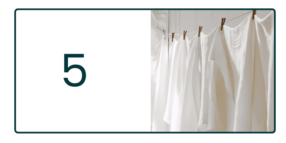 Photograph of clothes being hung by brown wooden pegs next to a number five green colour graphic