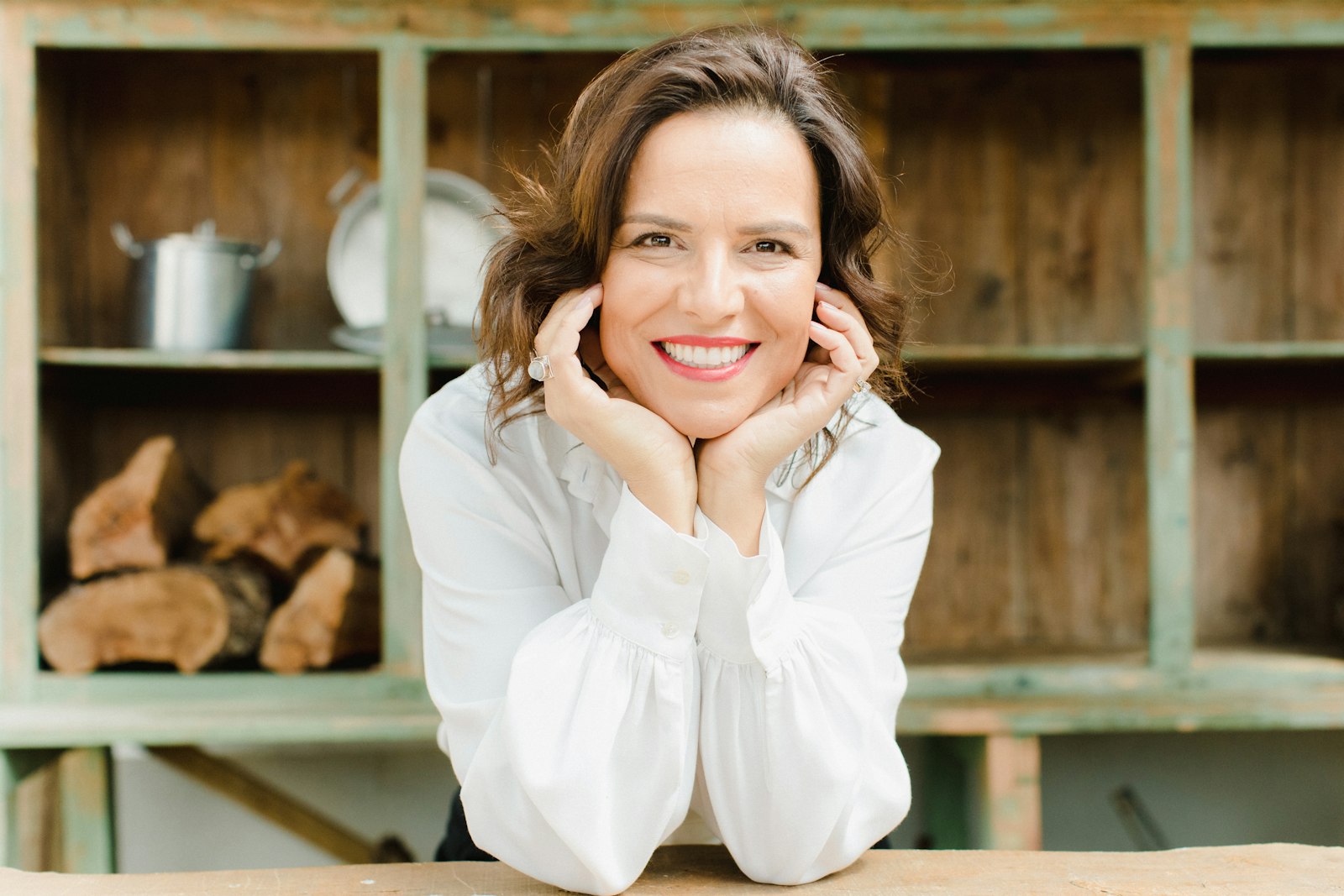 Confident smiling woman in midlife in a bright setting