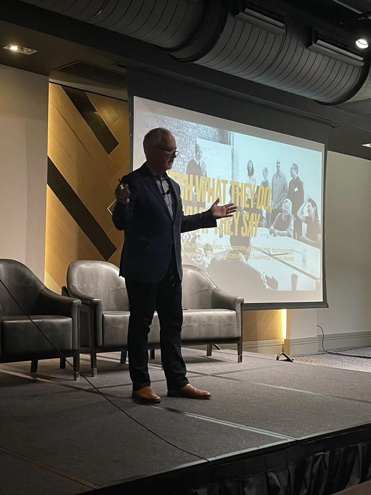 Keith Burton speaking to an audience about leadership