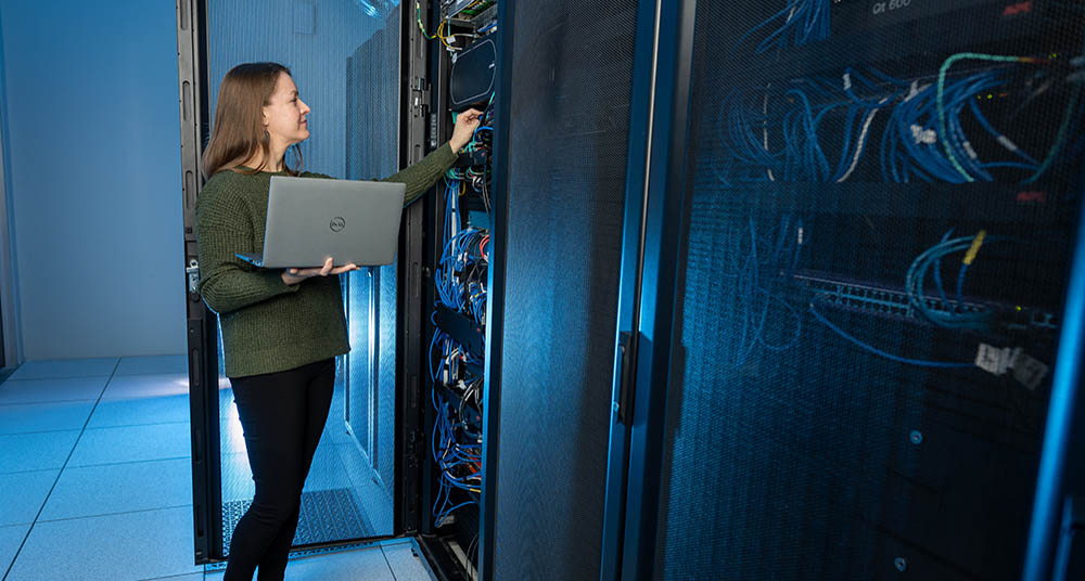 Minnkota employee working on IT system.