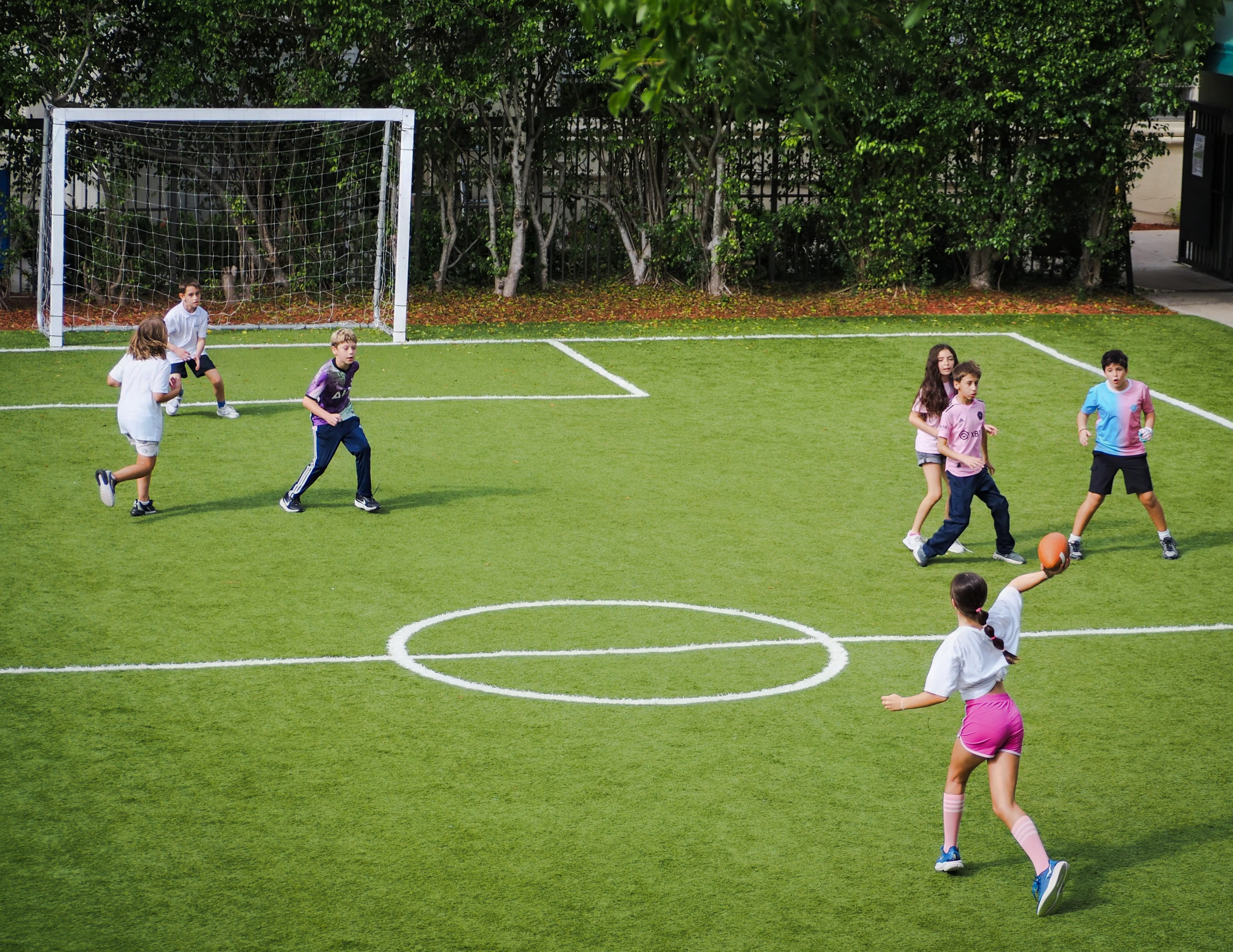 Gordon students playing a game on the school's turf field