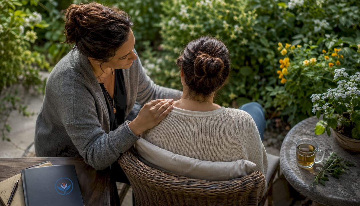 Supportive sitter reassuring during trip