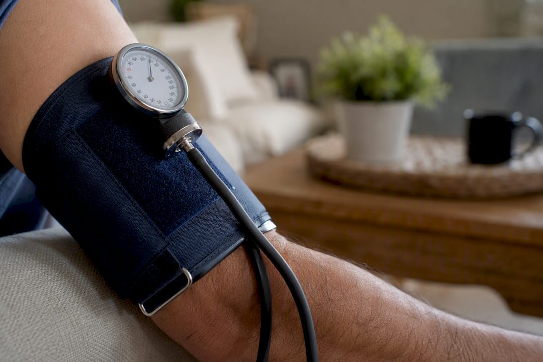 Blood pressure cuff measuring on arm