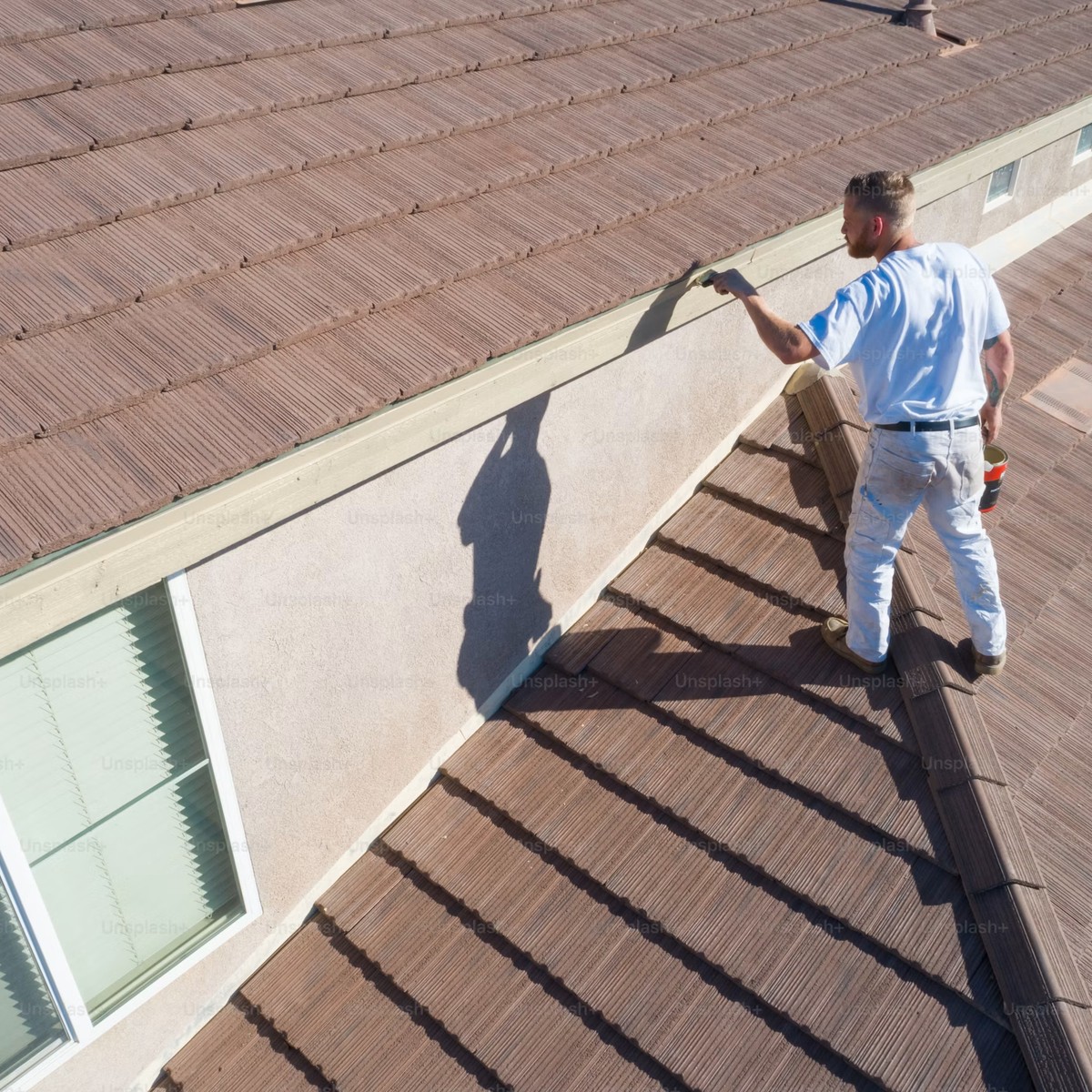 Roofing crew completing roof replacement in Tucson