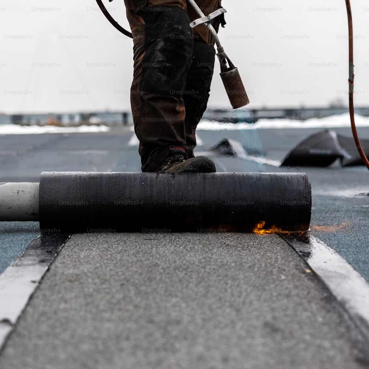 Commercial roofing crew completing commercial roofing in Tempe