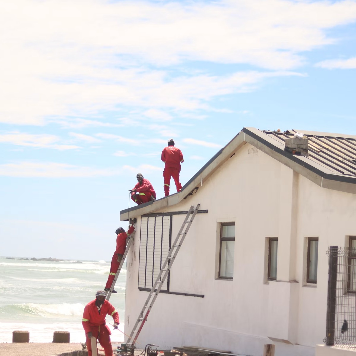 Commercial roofing crew working on commercial roofing in Chandler