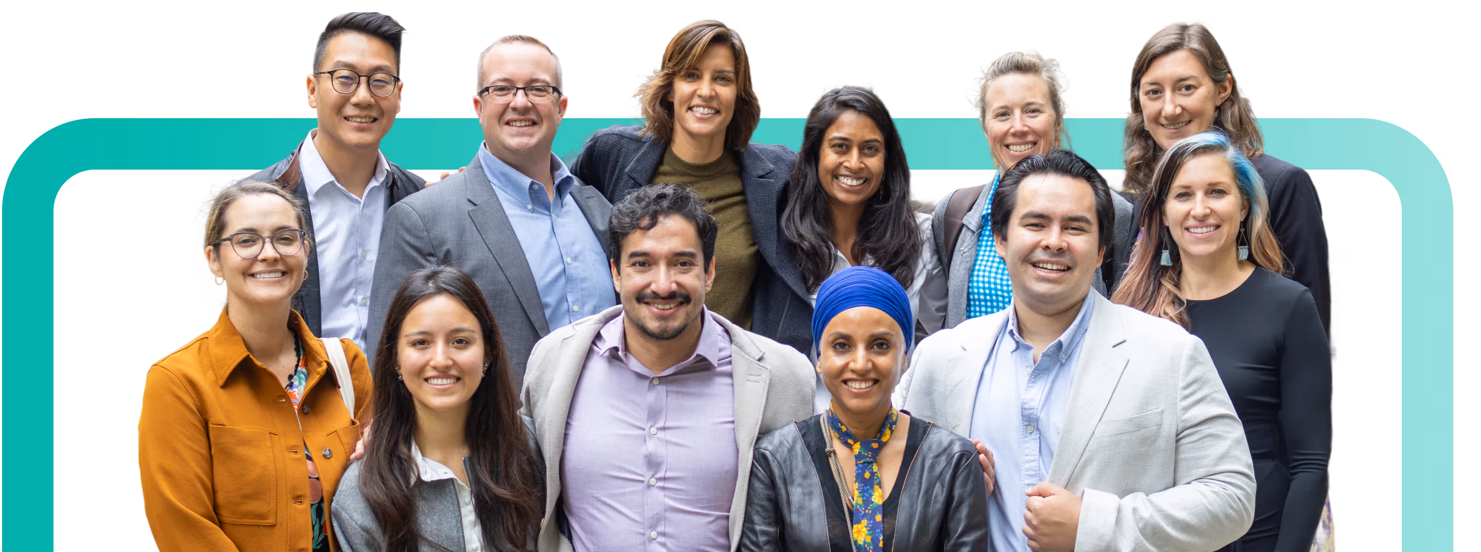 image of an african american harware technician and an asian american female in a helmet in a manufacturing setting