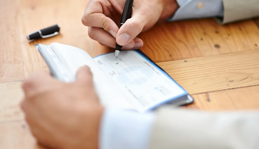 paying house rent via cheques in Abu Dhabi