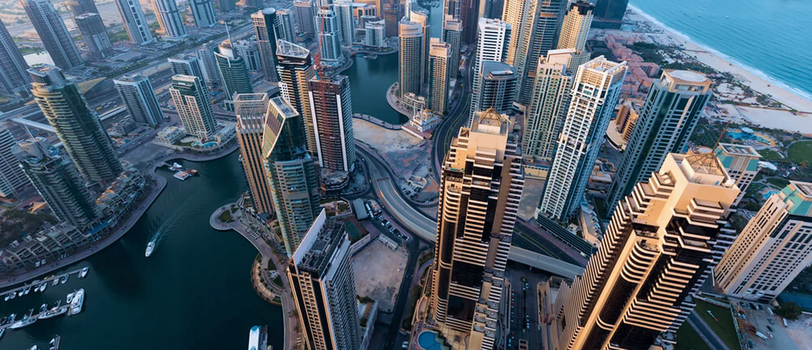 Aerial view of Dubai's skyscrapers with a focus on the highest rental income areas in the city