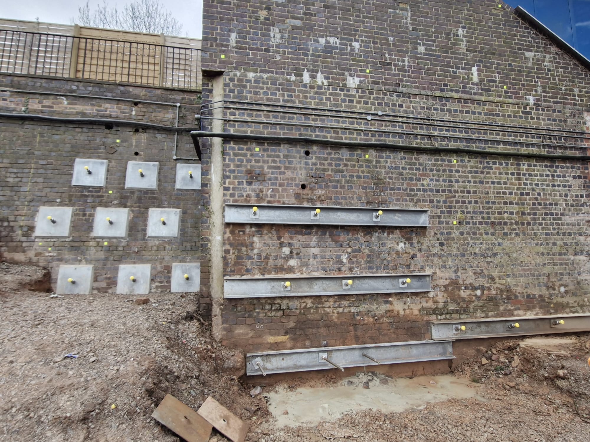 installation of anchor plates on retaining wall