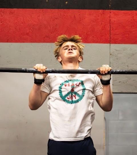 A person lifting a barAI-generated content may be incorrect.