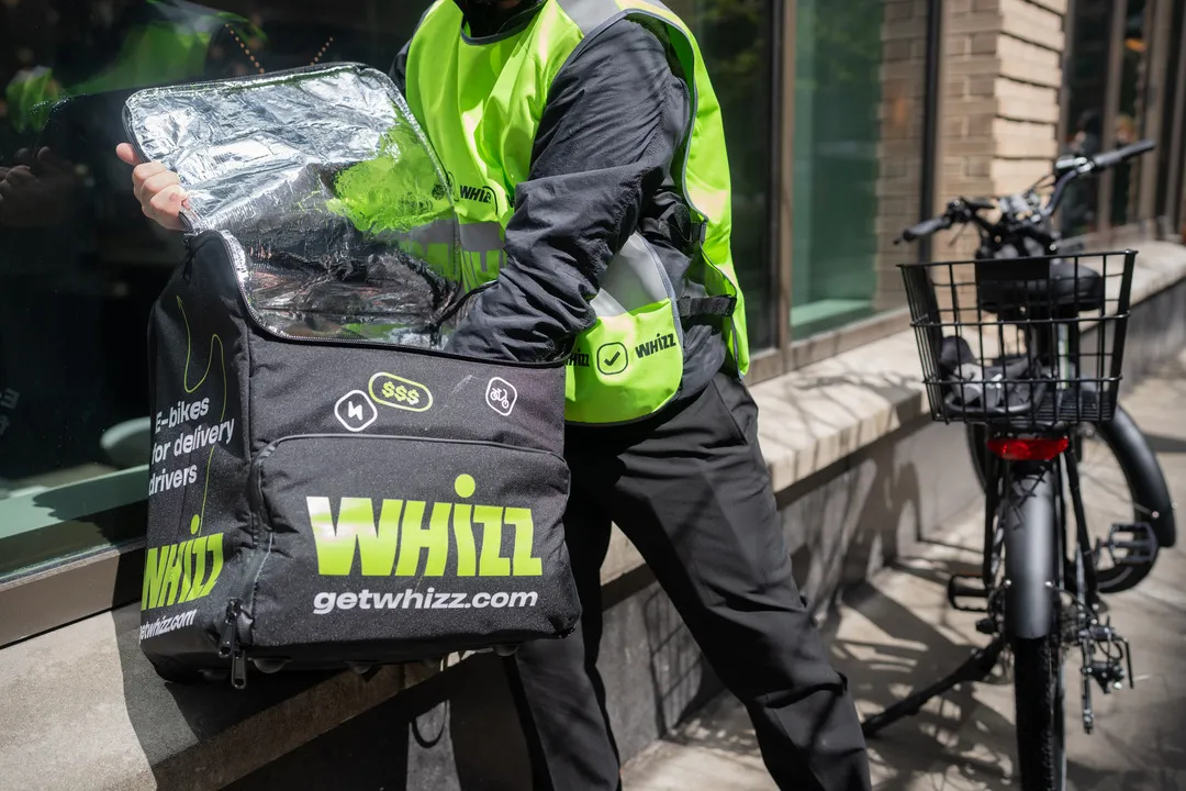 taking_more_orders_food_delivery_worker.webp