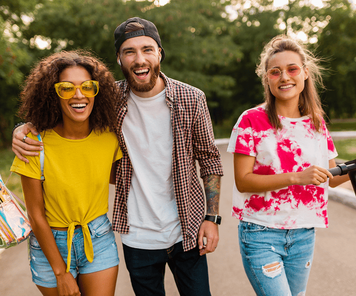 A group of 3 people hanging around