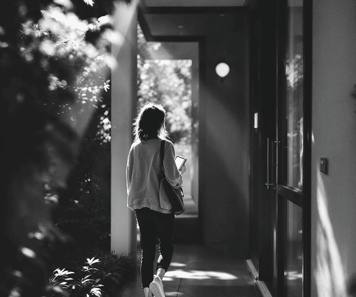 Young lady coming home