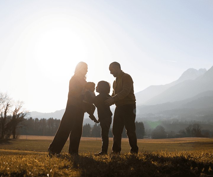 Family standing in the nature