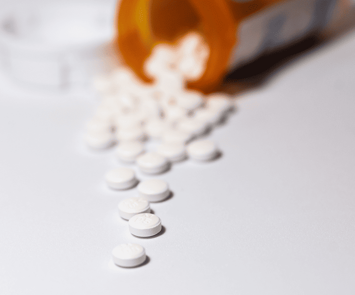 Pills coming out of the bottle