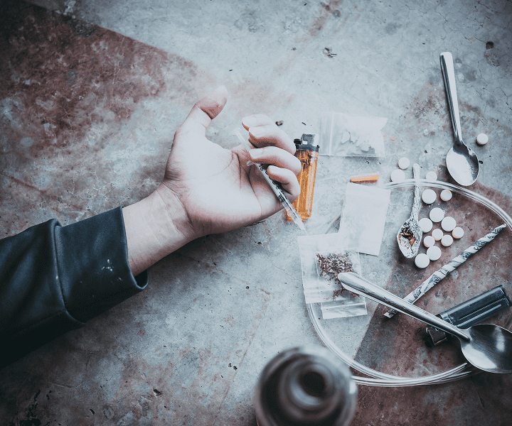 Man's hand after taking the heroin