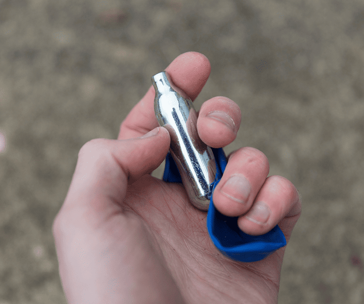 Man holding Nitrous oxide in his hand